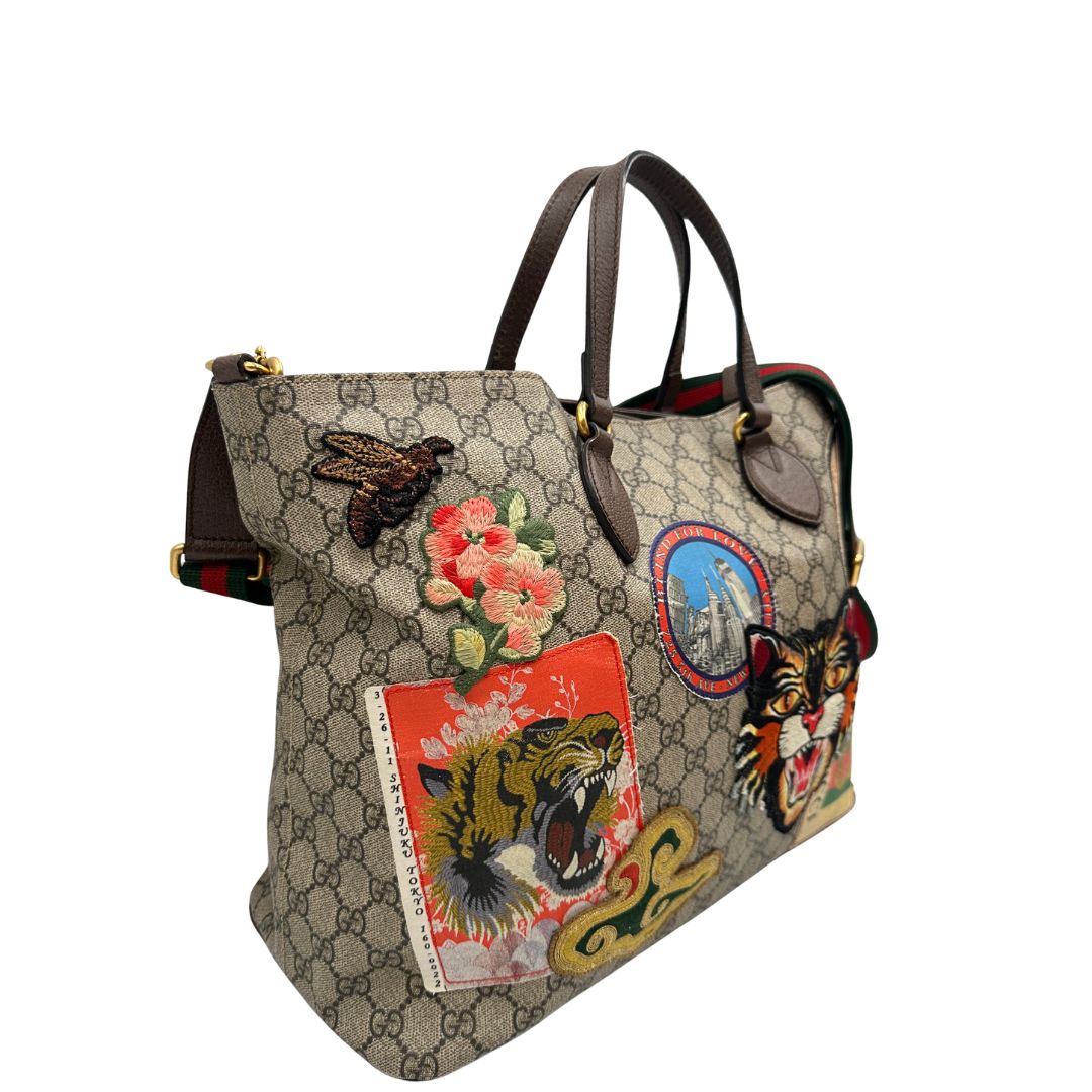 lato Borsa Gucci in canvas beige GG e finiture in pelle marrone, di lusso, originale, usata