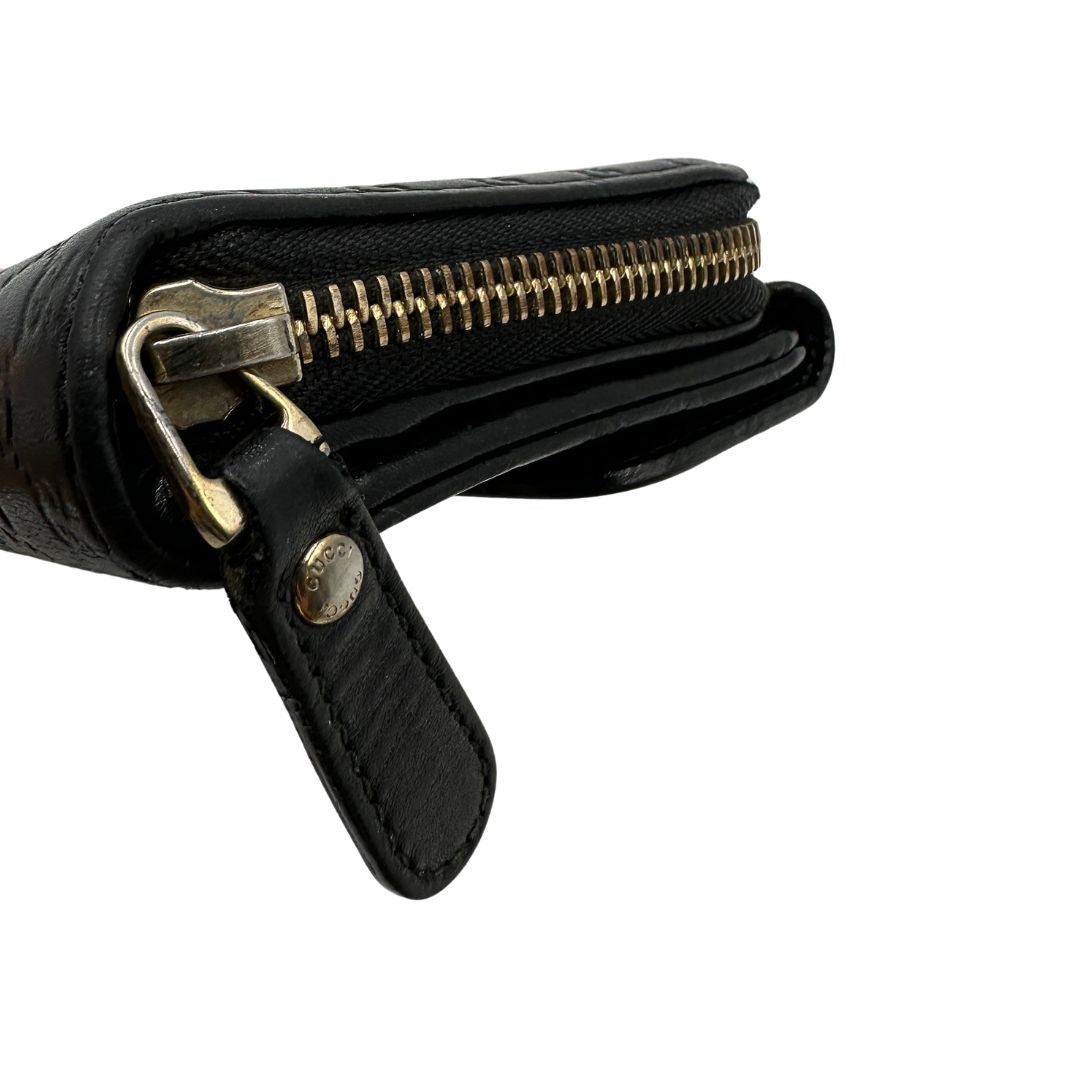  Portafoglio Gucci in pelle trama microguccissima nera