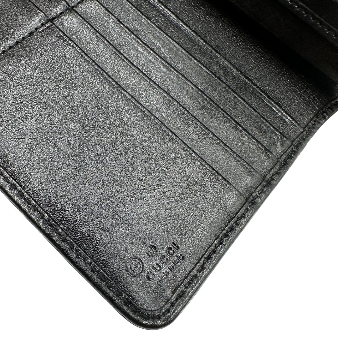  Portafoglio Gucci in pelle trama microguccissima nera