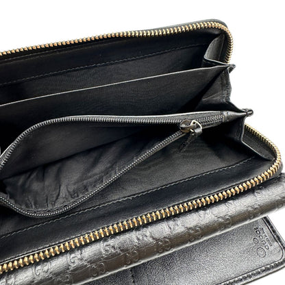  Portafoglio Gucci in pelle trama microguccissima nera