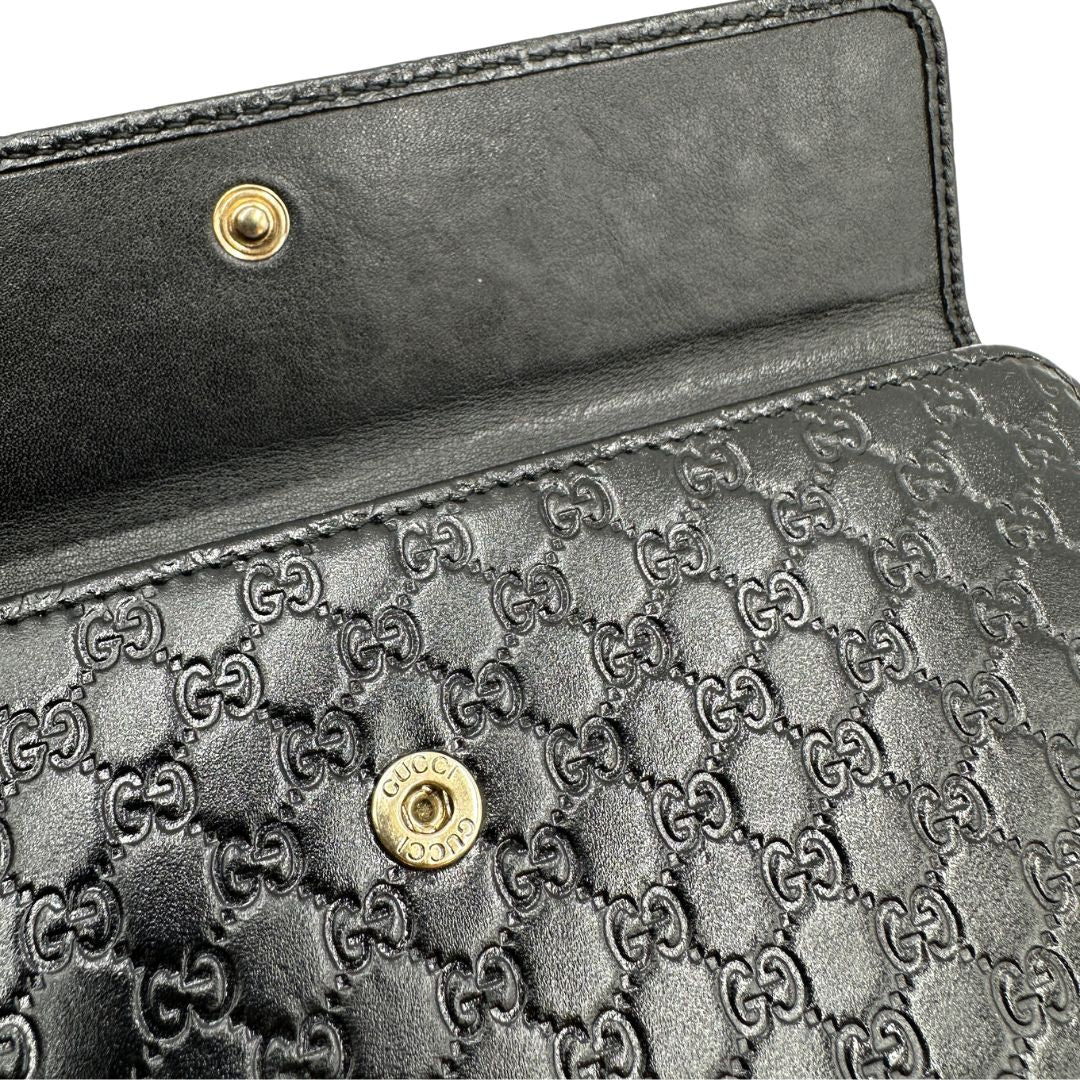  Portafoglio Gucci in pelle trama microguccissima nera