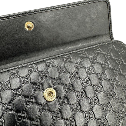  Portafoglio Gucci in pelle trama microguccissima nera