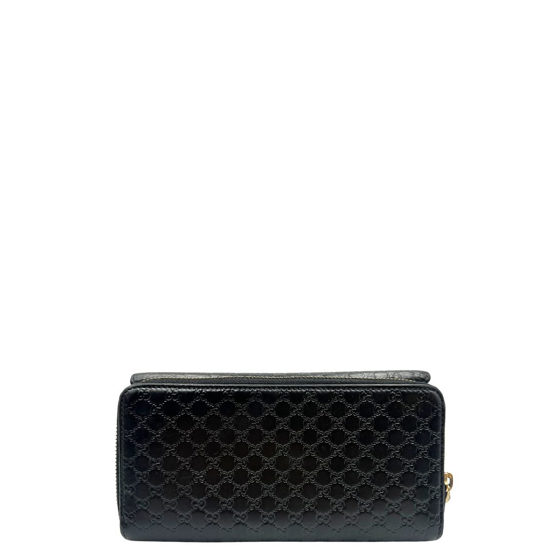  Portafoglio Gucci in pelle trama microguccissima nera