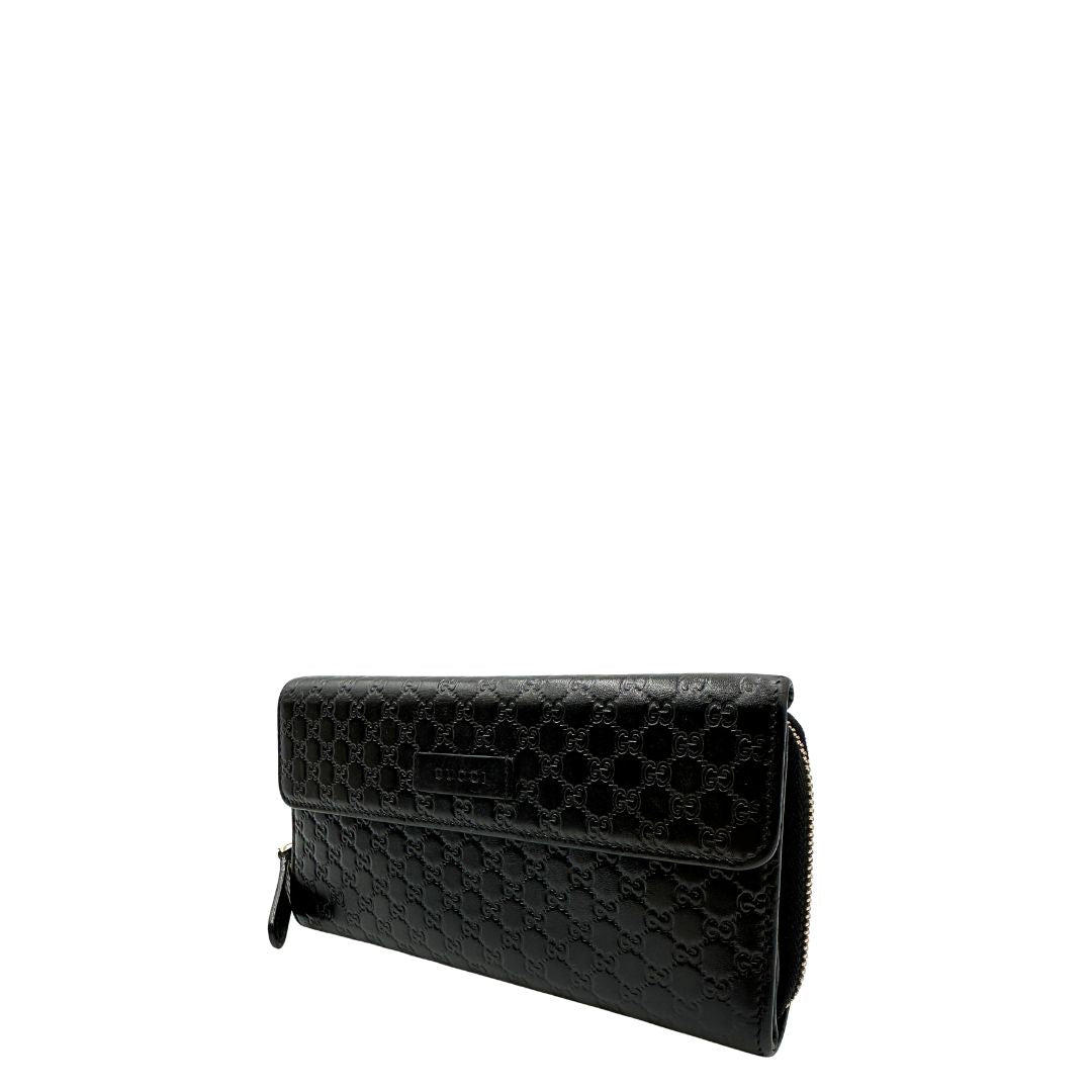  Portafoglio Gucci in pelle trama microguccissima nera