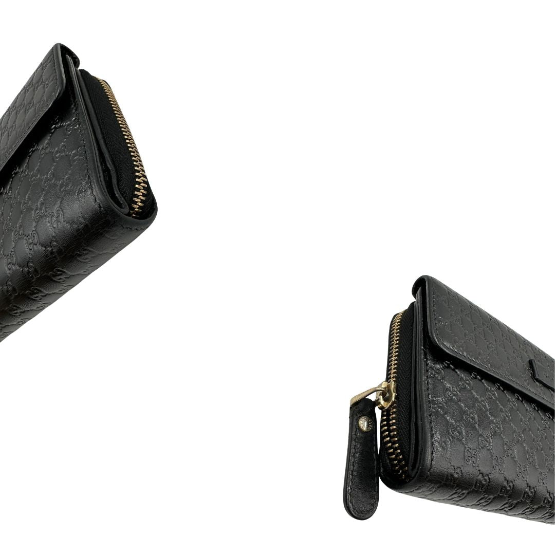  Portafoglio Gucci in pelle trama microguccissima nera