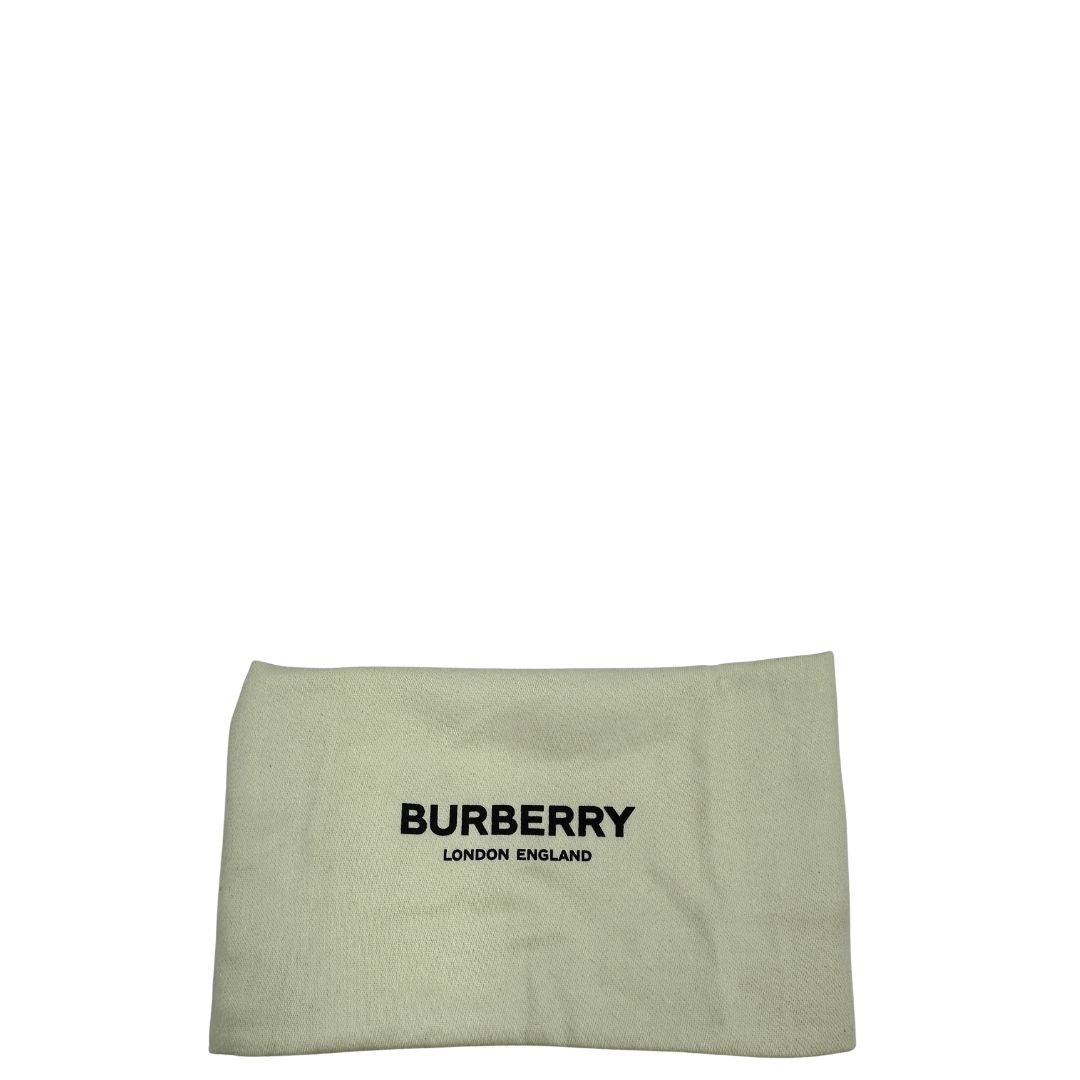 Dustbag borsa Burberry Snip in pelle liscia nera con tracolla regolabile e hardware dorato. Originale, di lusso, usata, in condizioni eccellenti. 