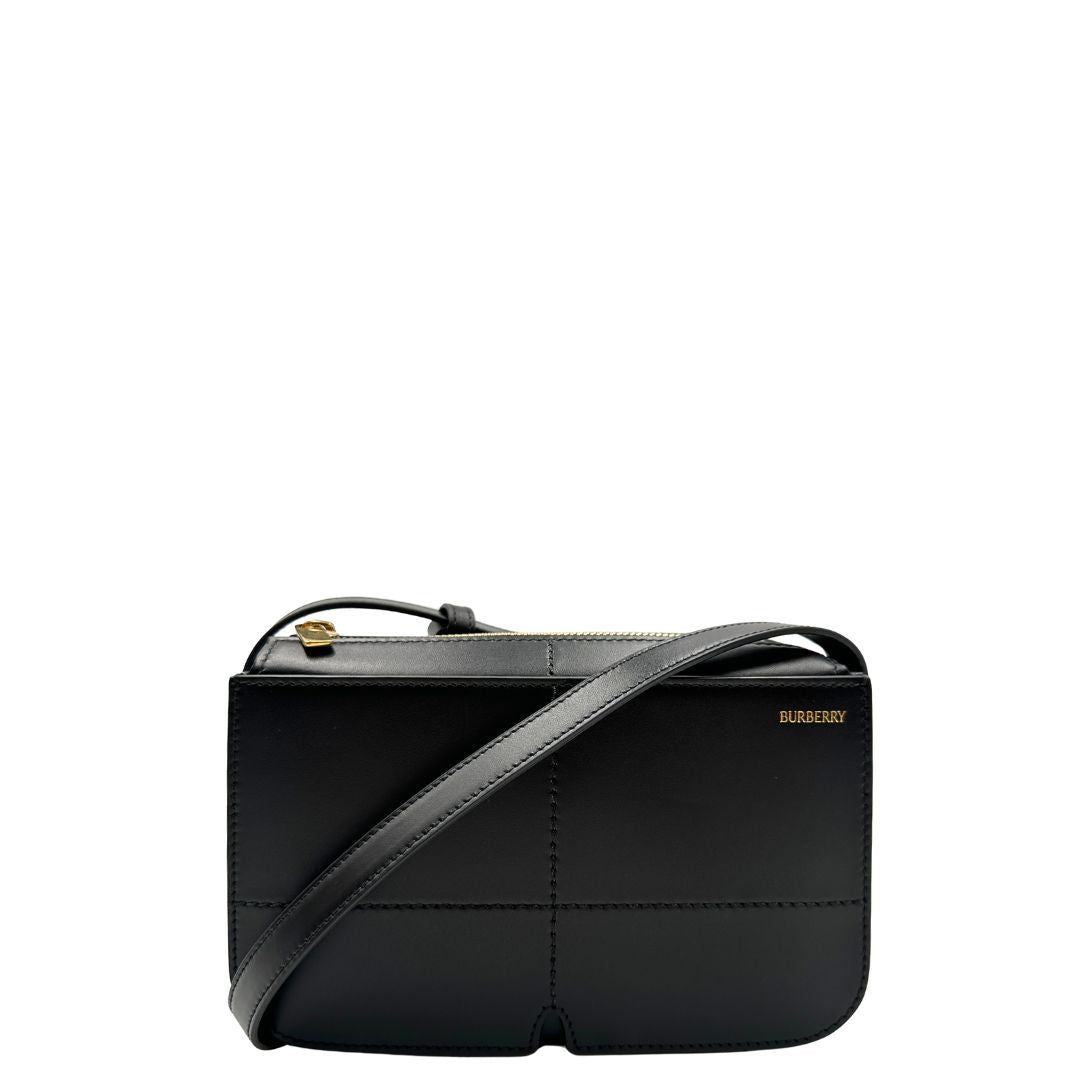 Front borsa Burberry Snip in pelle liscia nera con tracolla regolabile e hardware dorato. Originale, di lusso, usata, in condizioni eccellenti. 