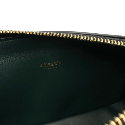 Logo interno borsa Burberry in pelle era con hardware dorato e tracolla regolabile. Originale, di lusso, usata, in condizioni eccellenti. 