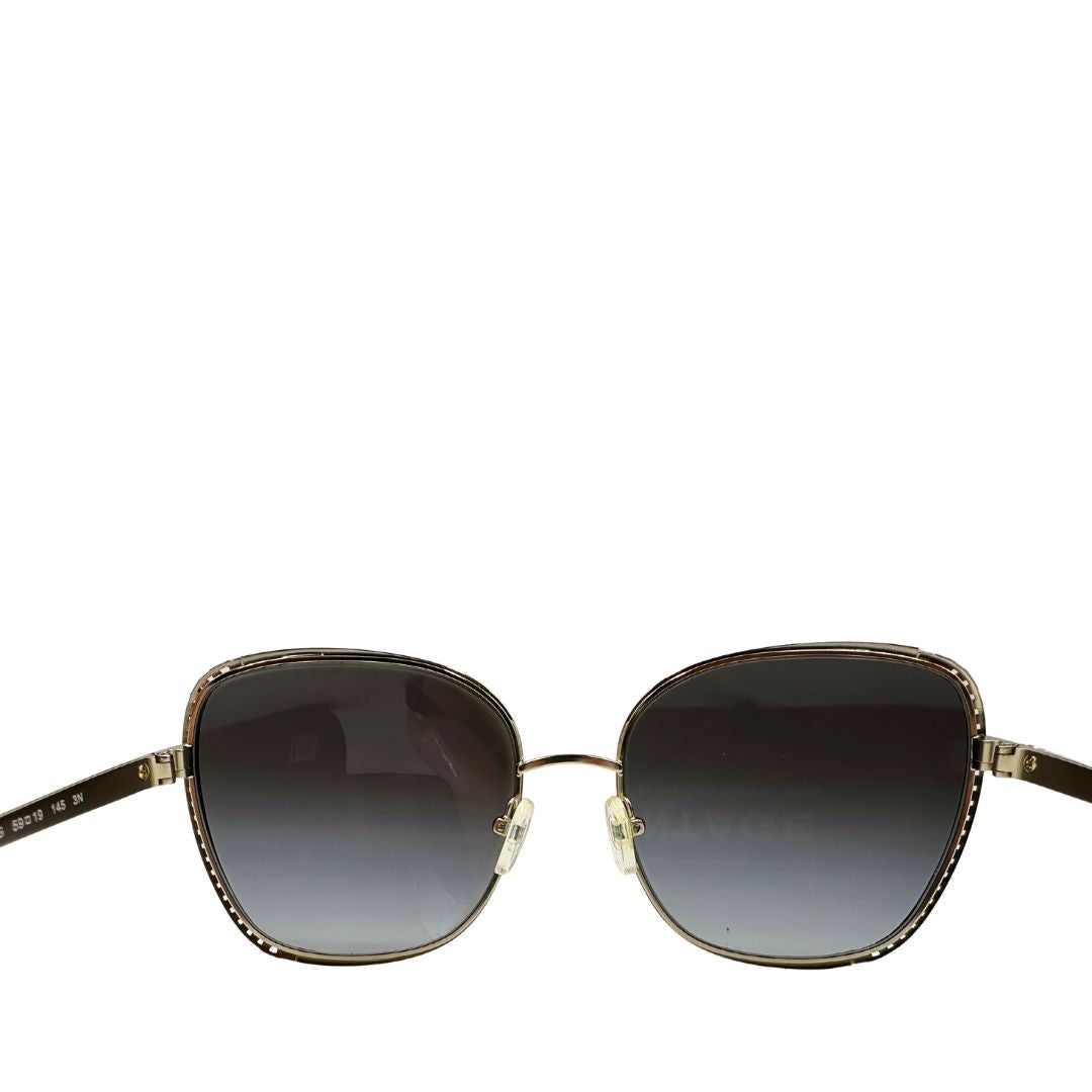 Occhiali da sole Michael Kors in metallo dorato con logo MK sulle asticelle