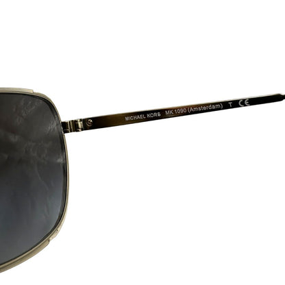 Occhiali da sole Michael Kors in metallo dorato con logo MK sulle asticelle