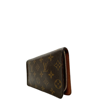 Laterale Portafoglio compatto Louis Vuitton in canvas marrone monogram, con chiusura con cerniera e parti metalliche dorate. Originale, di lusso, usato, in condizioni ottime. 