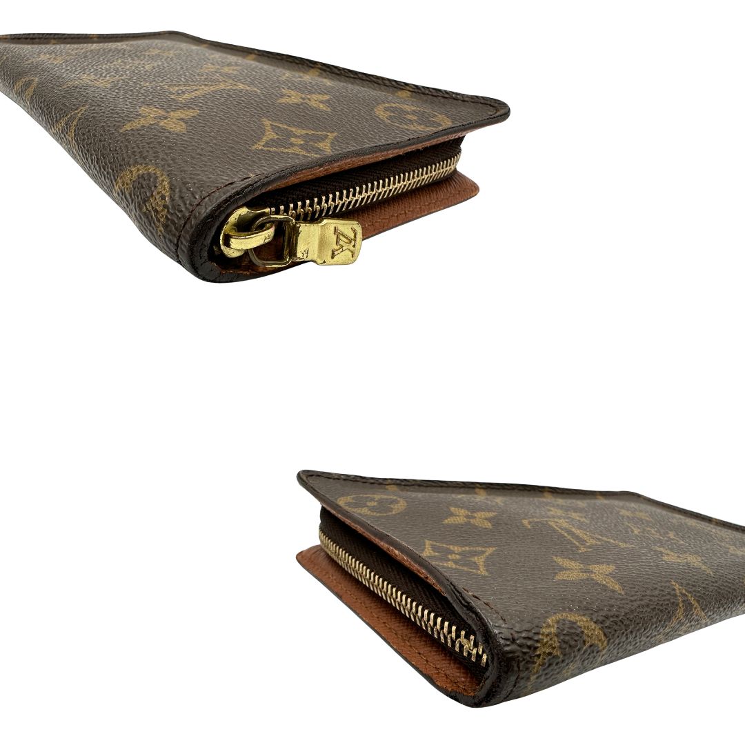 Angoli Portafoglio compatto Louis Vuitton in canvas marrone monogram, con chiusura con cerniera e parti metalliche dorate. Originale, di lusso, usato, in condizioni ottime. 