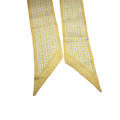 Bandeau Givenchy giallo  in 100% seta con trama logo bianca. Originale, di lusso, usato, in condizioni eccellenti. 