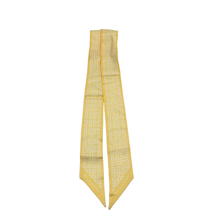 Bandeau Givenchy giallo  in 100% seta con trama logo bianca. Originale, di lusso, usato, in condizioni eccellenti. 