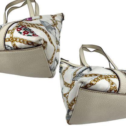 angoli  Borsa Gucci in tessuto con trama multicolor e finiture in pelle color bianco gesso, di lusso, originale, ottime condizioni, usata 