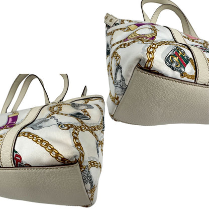 angoli  Borsa Gucci in tessuto con trama multicolor e finiture in pelle color bianco gesso, di lusso, originale, ottime condizioni, usata 
