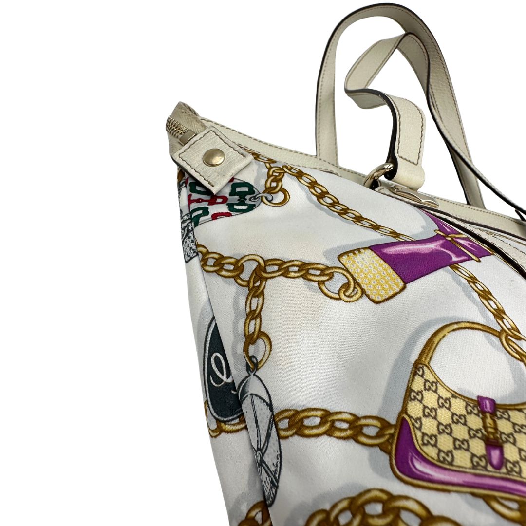 angolo  Borsa Gucci in tessuto con trama multicolor e finiture in pelle color bianco gesso, di lusso, originale, ottime condizioni, usata 