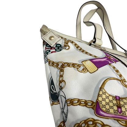 angolo  Borsa Gucci in tessuto con trama multicolor e finiture in pelle color bianco gesso, di lusso, originale, ottime condizioni, usata 