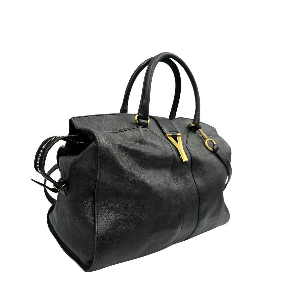 Laterale borsa Yves Saint Laurent modello Cabas Chyc in pelle nera con parti metalliche dorate. Originale, di lusso, usato, in condizioni ottime.