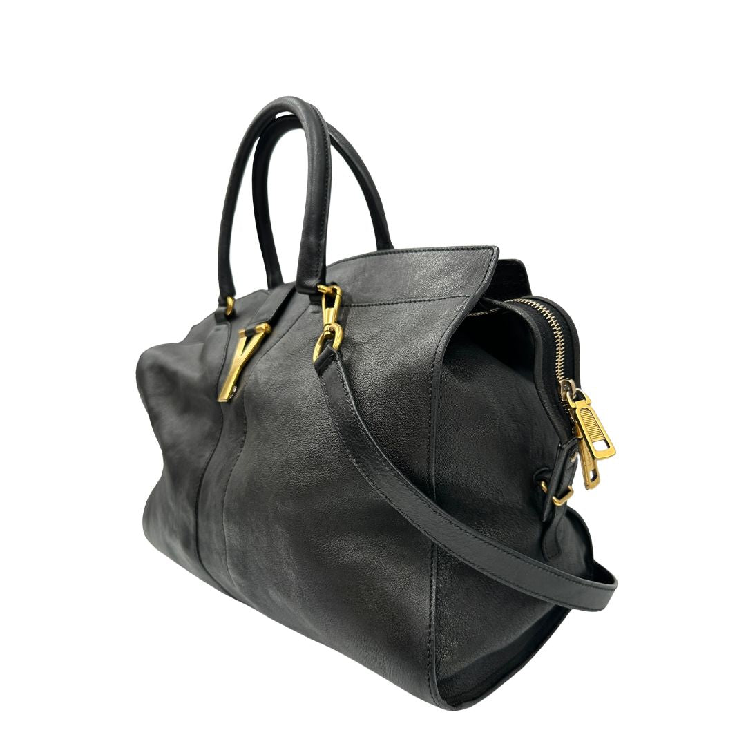 Laterale borsa Yves Saint Laurent modello Cabas Chyc in pelle nera con parti metalliche dorate. Originale, di lusso, usato, in condizioni ottime.