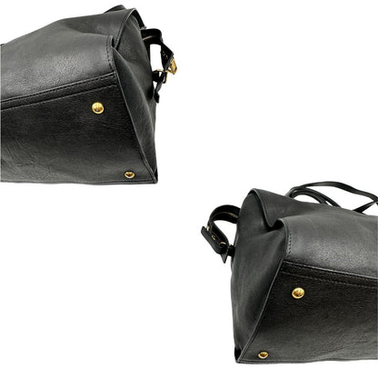 Angoli borsa Yves Saint Laurent modello Cabas Chyc in pelle nera con parti metalliche dorate. Originale, di lusso, usato, in condizioni ottime.