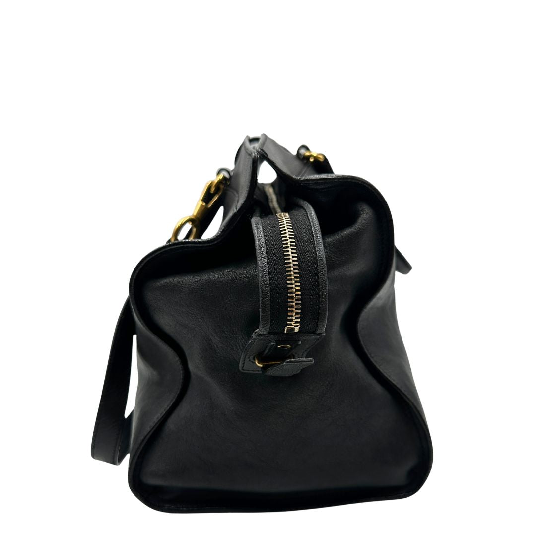 Laterale borsa Yves Saint Laurent modello Cabas Chyc in pelle nera con parti metalliche dorate. Originale, di lusso, usato, in condizioni ottime.