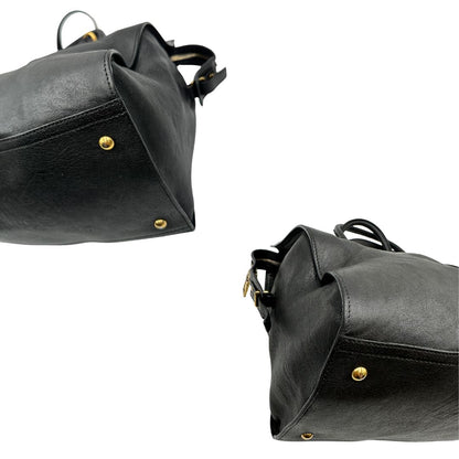 Angoli borsa Yves Saint Laurent modello Cabas Chyc in pelle nera con parti metalliche dorate. Originale, di lusso, usato, in condizioni ottime.
