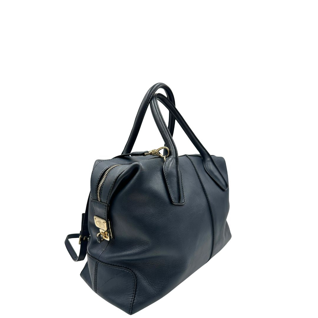 Lato, Borsa Tod's in pelle blu indossabile a tracolla, a spalla o a mano. Originale, usata, di lusso, in ottime condizioni.