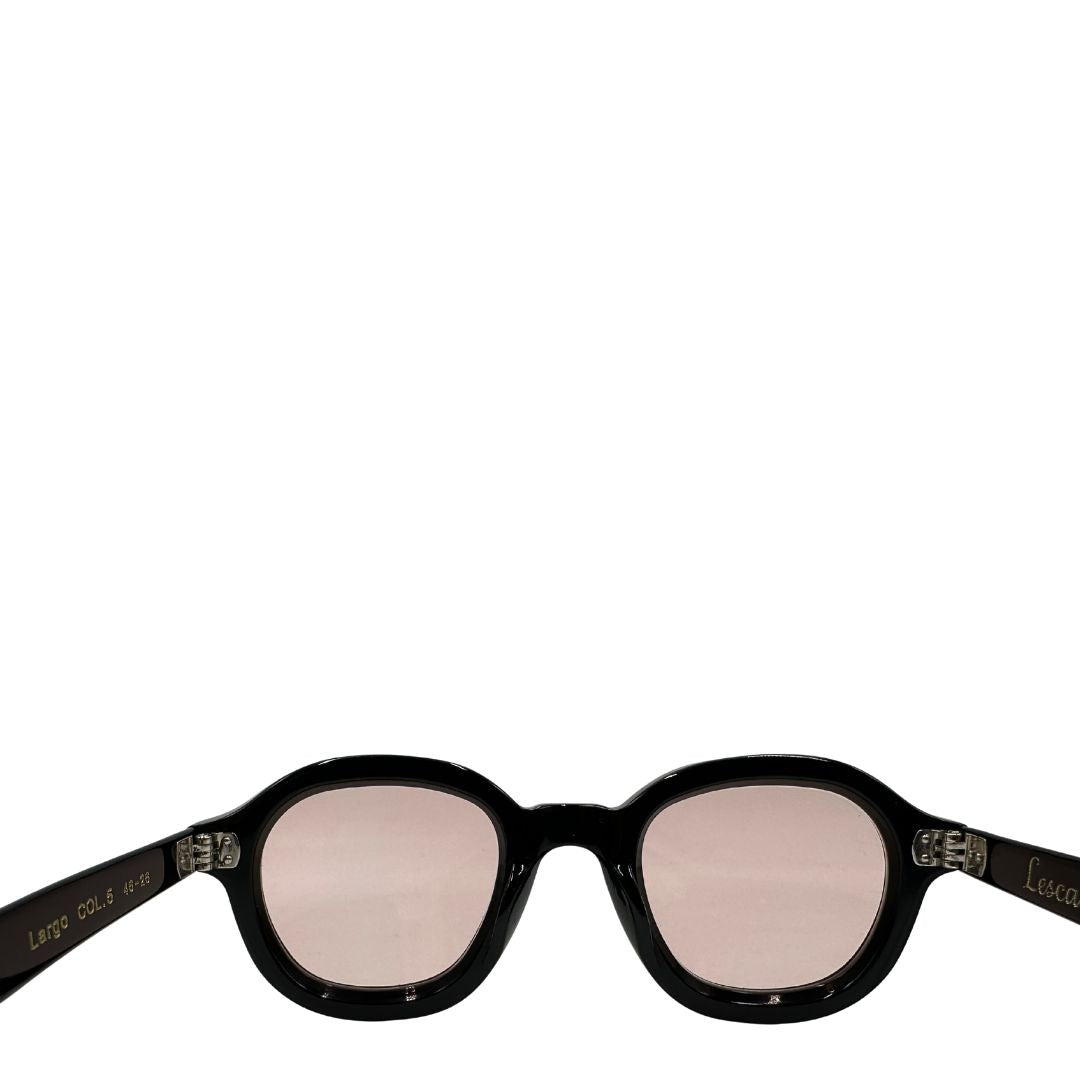 Occhiali da sole Lesca con montatura nera spessa e forma panto arrotondata. Lenti sfumate sui toni del rosa. Originali, di lusso, usati, in condizioni ottime.