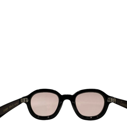 Occhiali da sole Lesca con montatura nera spessa e forma panto arrotondata. Lenti sfumate sui toni del rosa. Originali, di lusso, usati, in condizioni ottime.
