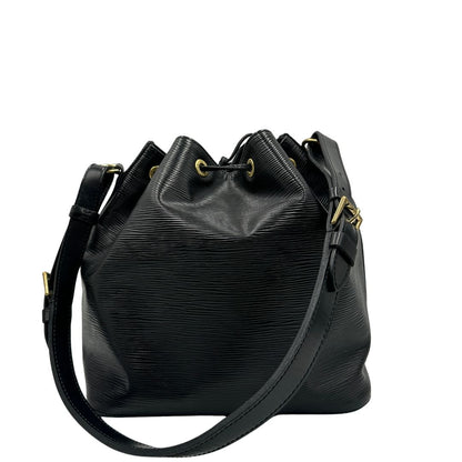 Retro, Secchiello Noé Louis Vuitton in pelle Epi nera con parti metalliche dorate e manico regolabile con fibbia. Indossabile a spalla.