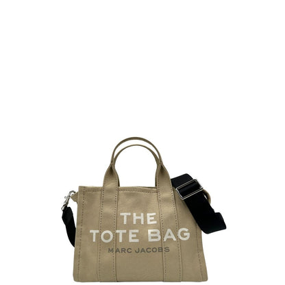 Front, Borsa Marc Jacobs in tessuto color sabbia nella versione small. Indossabile a tracolla oppure a mano. Originale, usata, di lusso, in ottime condizioni 