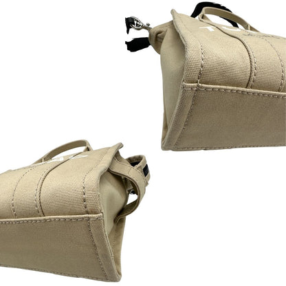 Angoli, Borsa Marc Jacobs in tessuto color sabbia nella versione small. Indossabile a tracolla oppure a mano. Originale, usata, di lusso, in ottime condizioni 