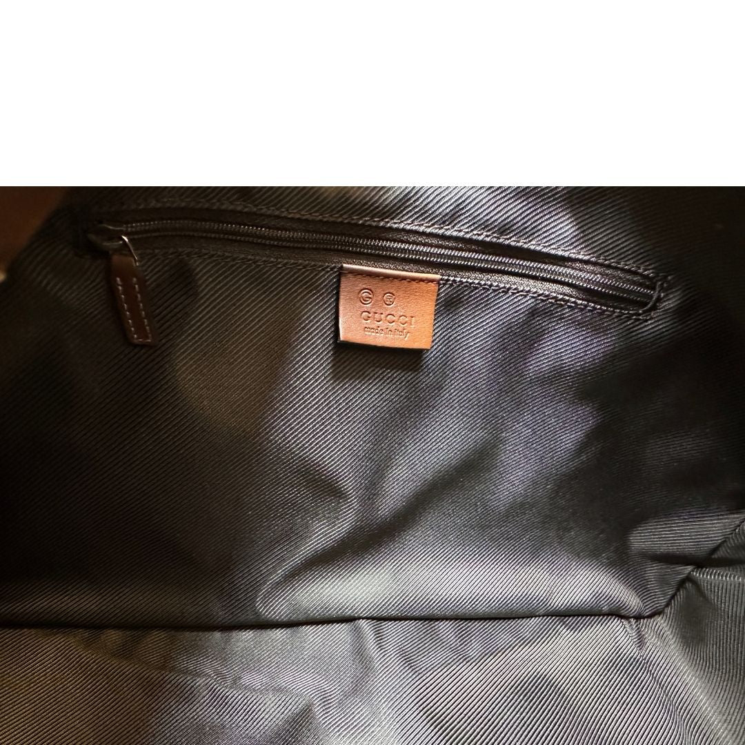 interno Borsa Gucci in tessuto color sabbia con finiture in pelle GG marrone 