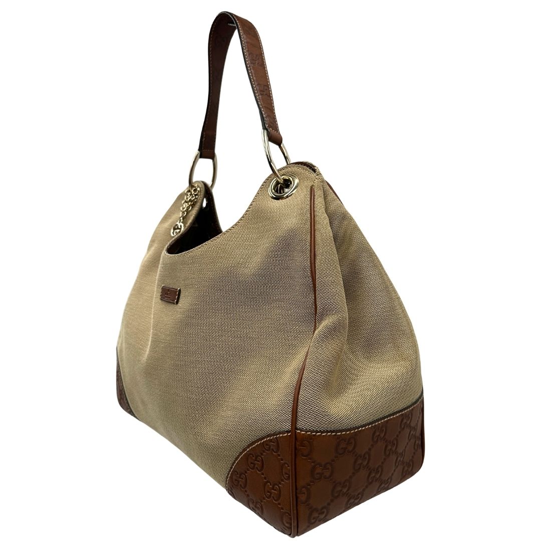 lato Borsa Gucci in tessuto color sabbia con finiture in pelle GG marrone 
