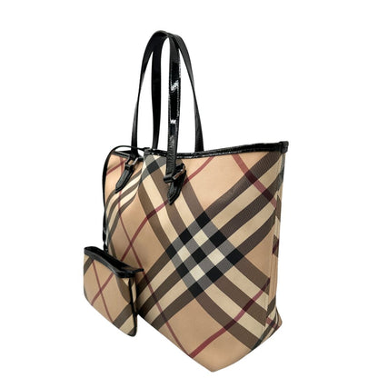 Lato, Borsa Burberry in canvas trama tartan e finiture in pelle vernis nera, puoi portarla a spalla. Originale, usata, di lussso, in ottime condizioni.