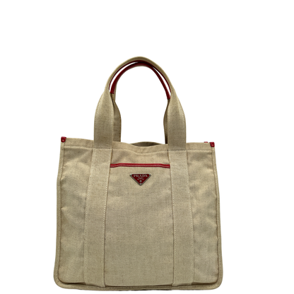 Front, Borsa Tote Prada in tessuto Jacquard beige con finiture in pelle rossa. Indossabile a mano. Originale, usata, di lusso, in ottime condizioni.
