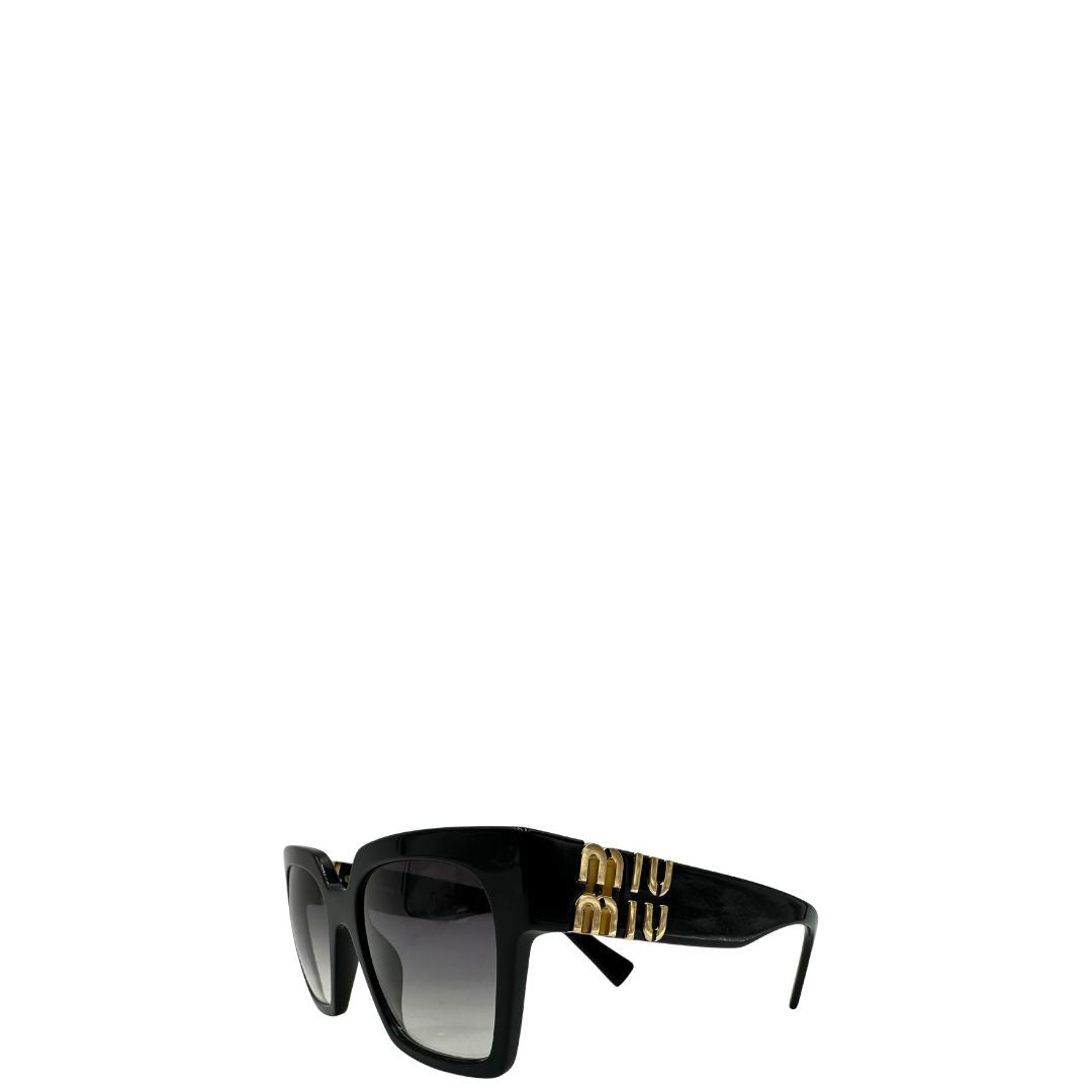 Occhiali da sole Miu Miu in acetato nero con hardware dorato. Originale, usati, di lusso, in ottyime condizioni.