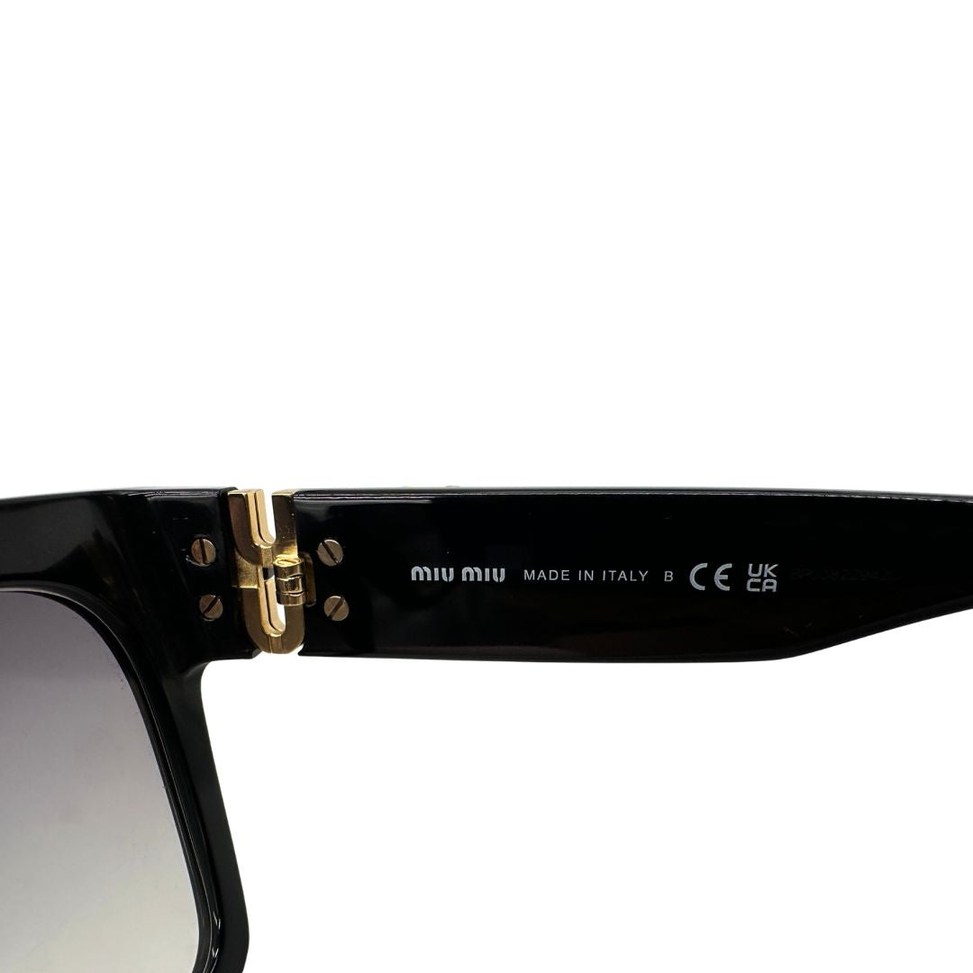 Occhiali da sole Miu Miu in acetato nero con hardware dorato. Originale, usati, di lusso, in ottyime condizioni.