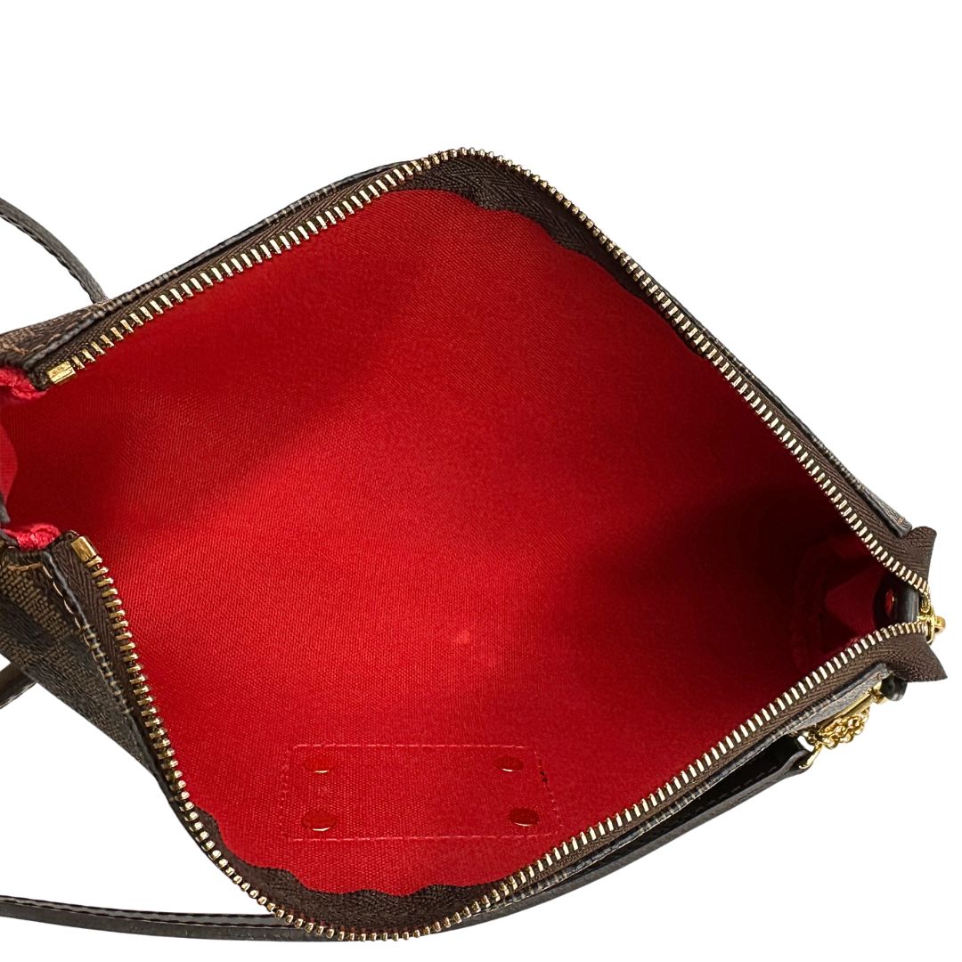 Pochette Eva Damier Ébène Louis Vuitton