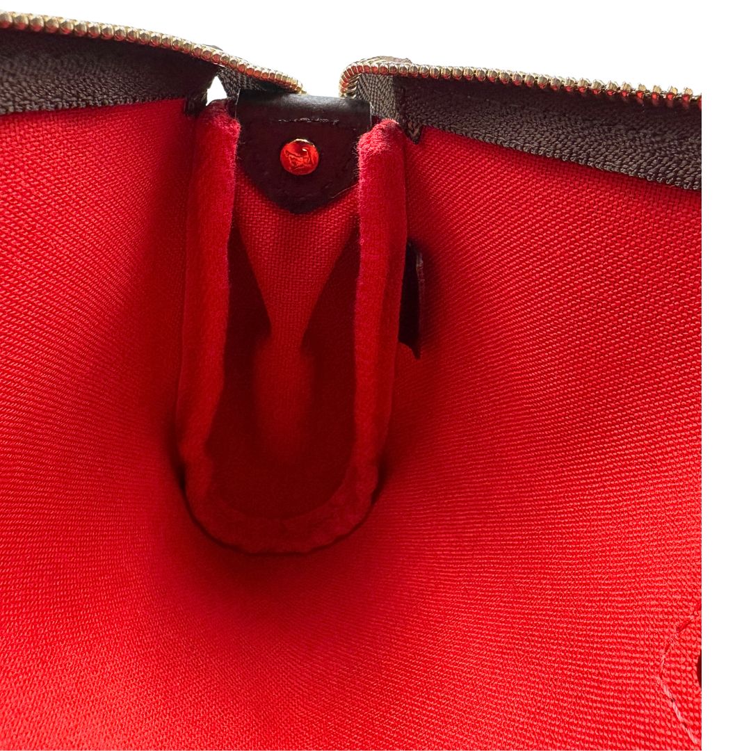 Pochette Eva Damier Ébène Louis Vuitton