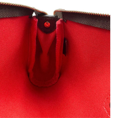 Pochette Eva Damier Ébène Louis Vuitton