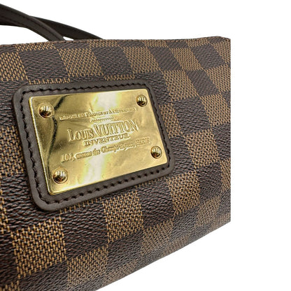 Pochette Eva Damier Ébène Louis Vuitton