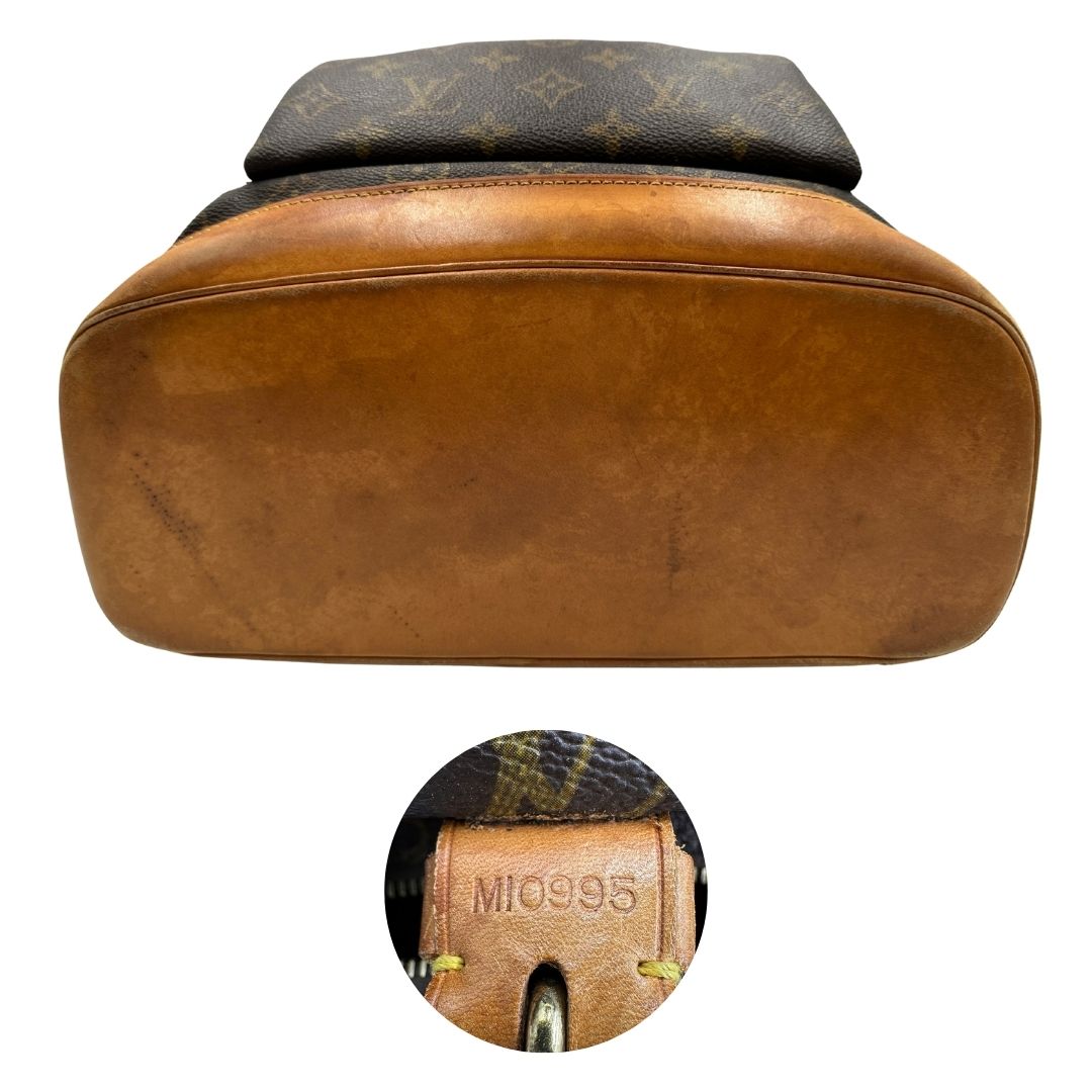 Base e codice di uno zaino Montsouris GM in canvas marrone monogram con finiture in vacchetta naturale.