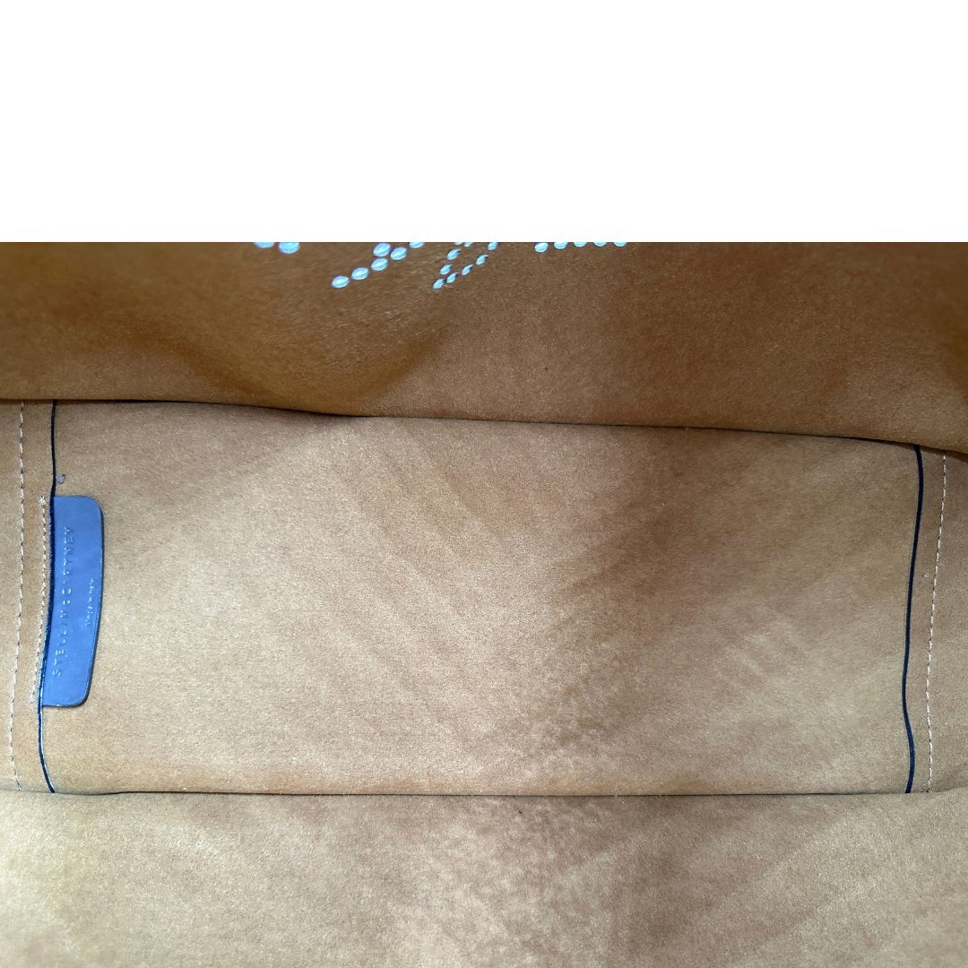 interno della borsa Stella McCartney in ecopelle verniciata grigia
