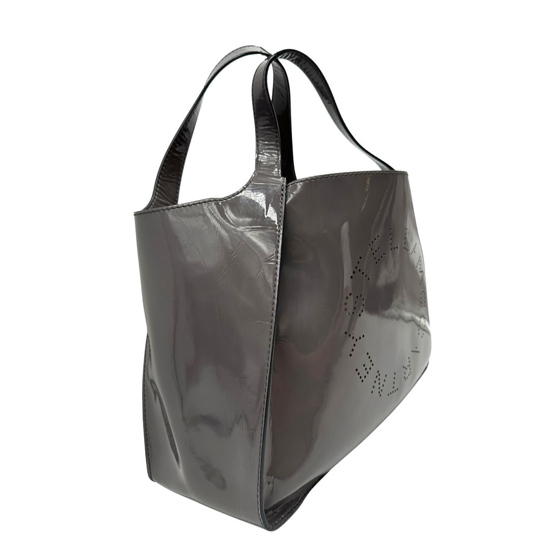 lato Borsa Stella McCartney in ecopelle verniciata grigia 