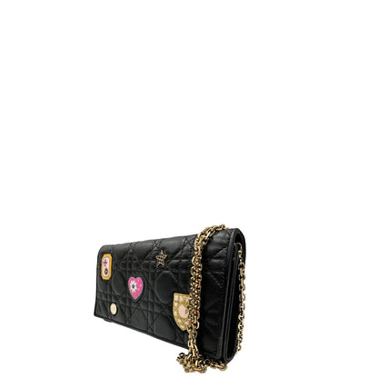 Laterali Wallet on Chain Dior in pelle cannage nera con Patch multicolore, parti metalliche dorate; da portare a mano oppure a tracolla. originale, usata, di lusso, in ottime condizioni