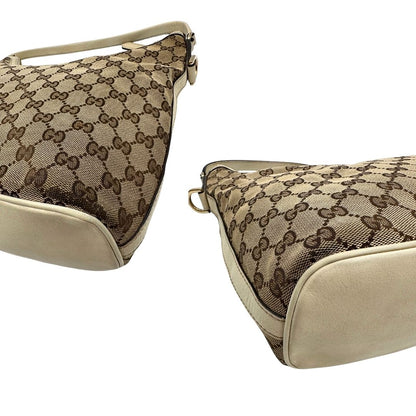 angoli Borsa Gucci in tessuto GG monogram beige con parti metalliche dorate e finiture in pelle; munita di un manico singolo, da portare a spalla 