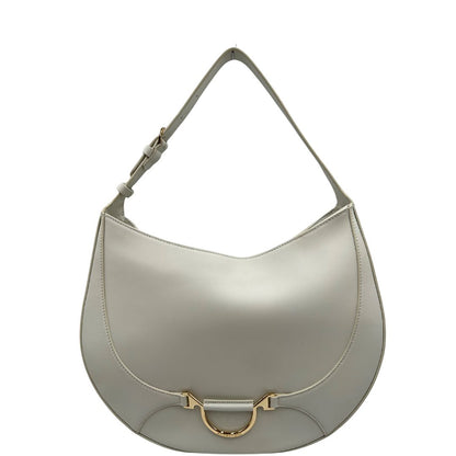 Front Borsa Borbonese in pelle bianca con parti metalliche dorate; munita di un manico singolo&nbsp;regolabile, indossabile a spalla