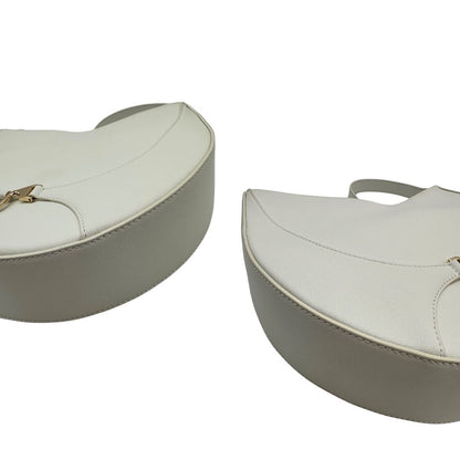 Angoli Borsa Borbonese in pelle bianca con parti metalliche dorate; munita di un manico singolo&nbsp;regolabile, indossabile a spalla